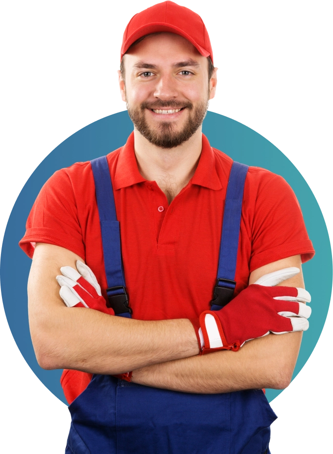 Smiling man in red shirt and gloves.